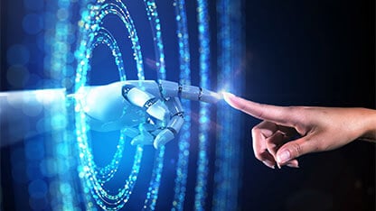 Abstract image of a woman's hand accessing the digital world from the real world