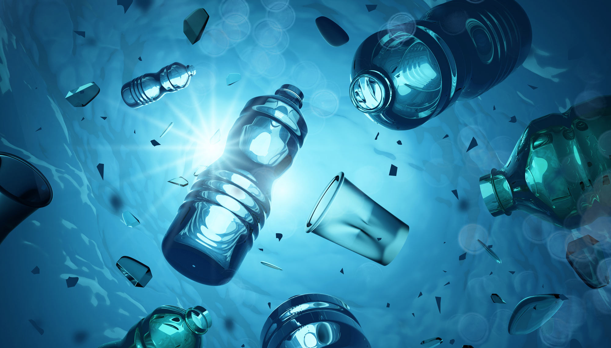 Plastic bottles and trash floating in the ocean